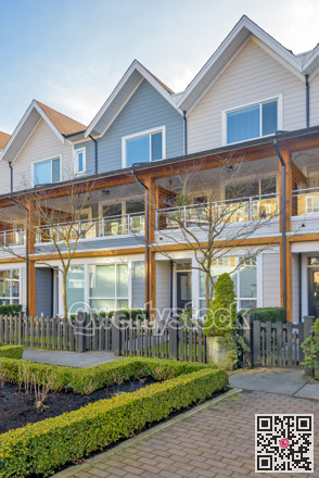 Row of nice residential townhouses on winter day in British Columbia, Canada