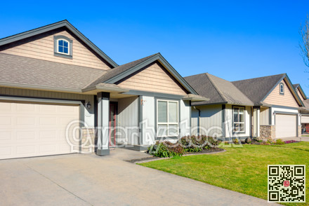 Row of nice residential houses on bright winter day in British Columbia, Canada