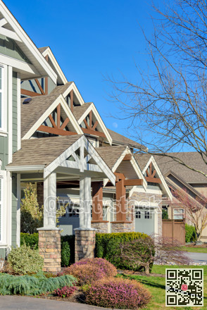 Front side of residential house on blue sky background