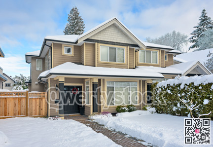 A perfect neighborhood. Entrance of nice residential house in snow