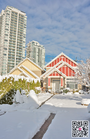 Modern high-rise and private residential houses in snow on winter season