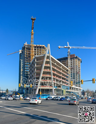 High-rise buildings under constraction on bright sunny winter day