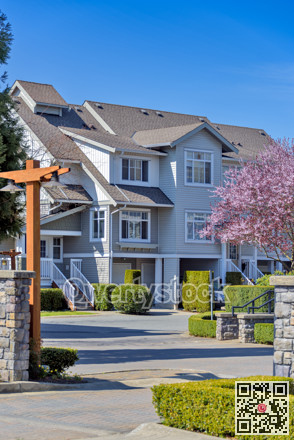 Gated residential complex on spring sunny day in British Columbia