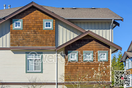 Top of residential townhouse on a bright spring day