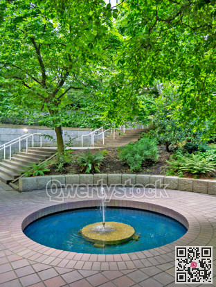 Small inner yard of residential area with fountain in downtown of Vancouver