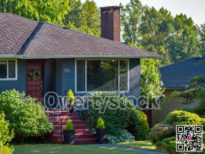 Main entrance of detached residential house on warm summer everning