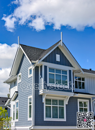 New residential townhouse on bright sunny day