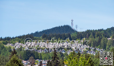 Townscape of residential district on mountain and blue sky background