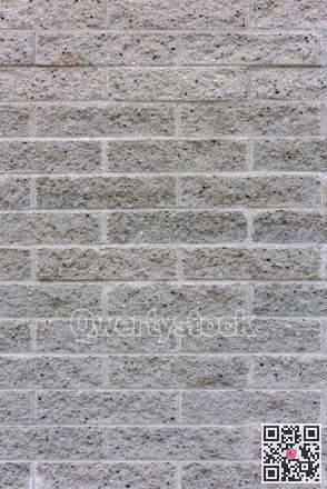 Concrete wall stylized under texture of silicate brick masonry