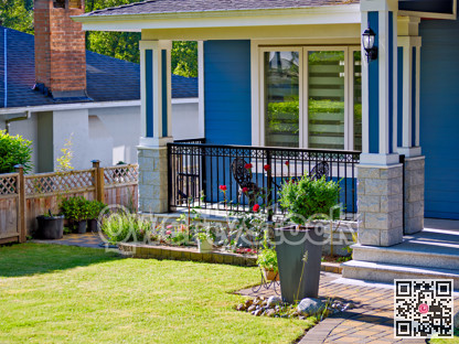 Front yard lawn and corner of residential house on spring season
