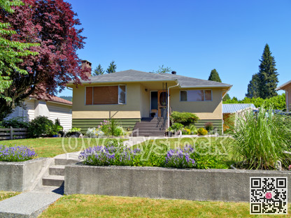 A perfect neighborhood. Neat residential house on the land terrace with flowers