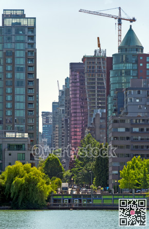 View at one of Vancouver downtown streets with high-rise residential buildings at the waterfront