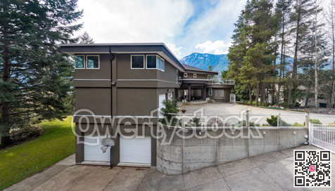 Luxury residential house on mountain background