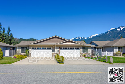 New residential duplex house on beautiful nature background in British Columbia